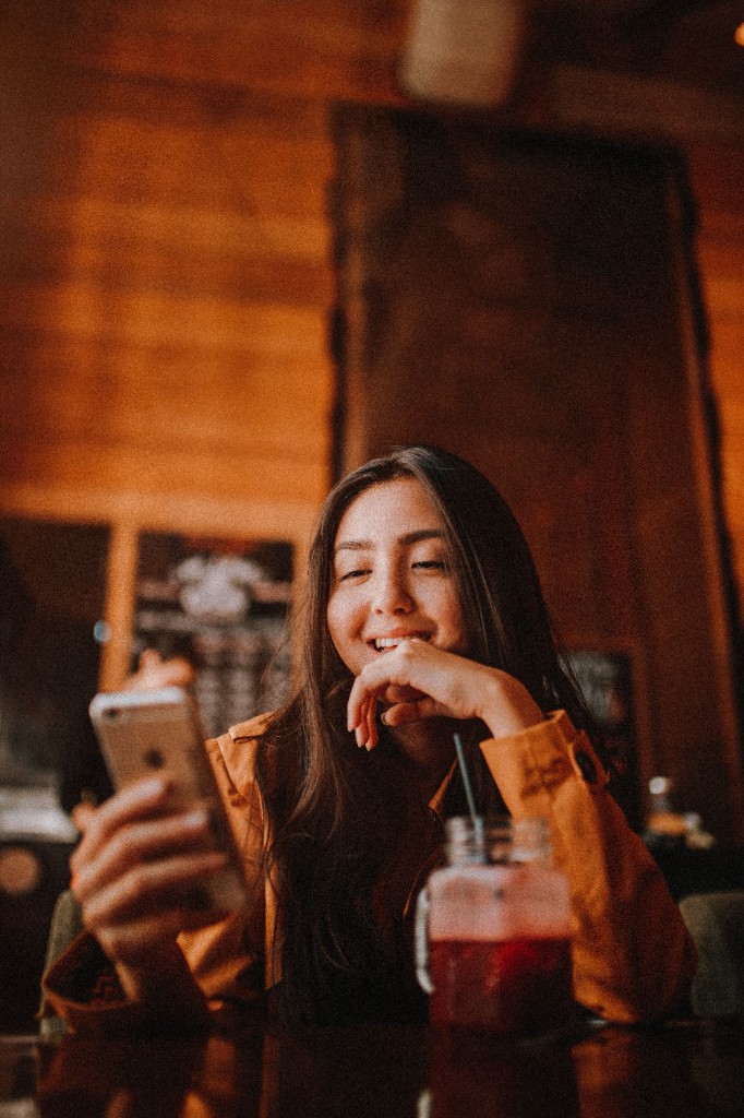Person using a smartphone for automated business workflows